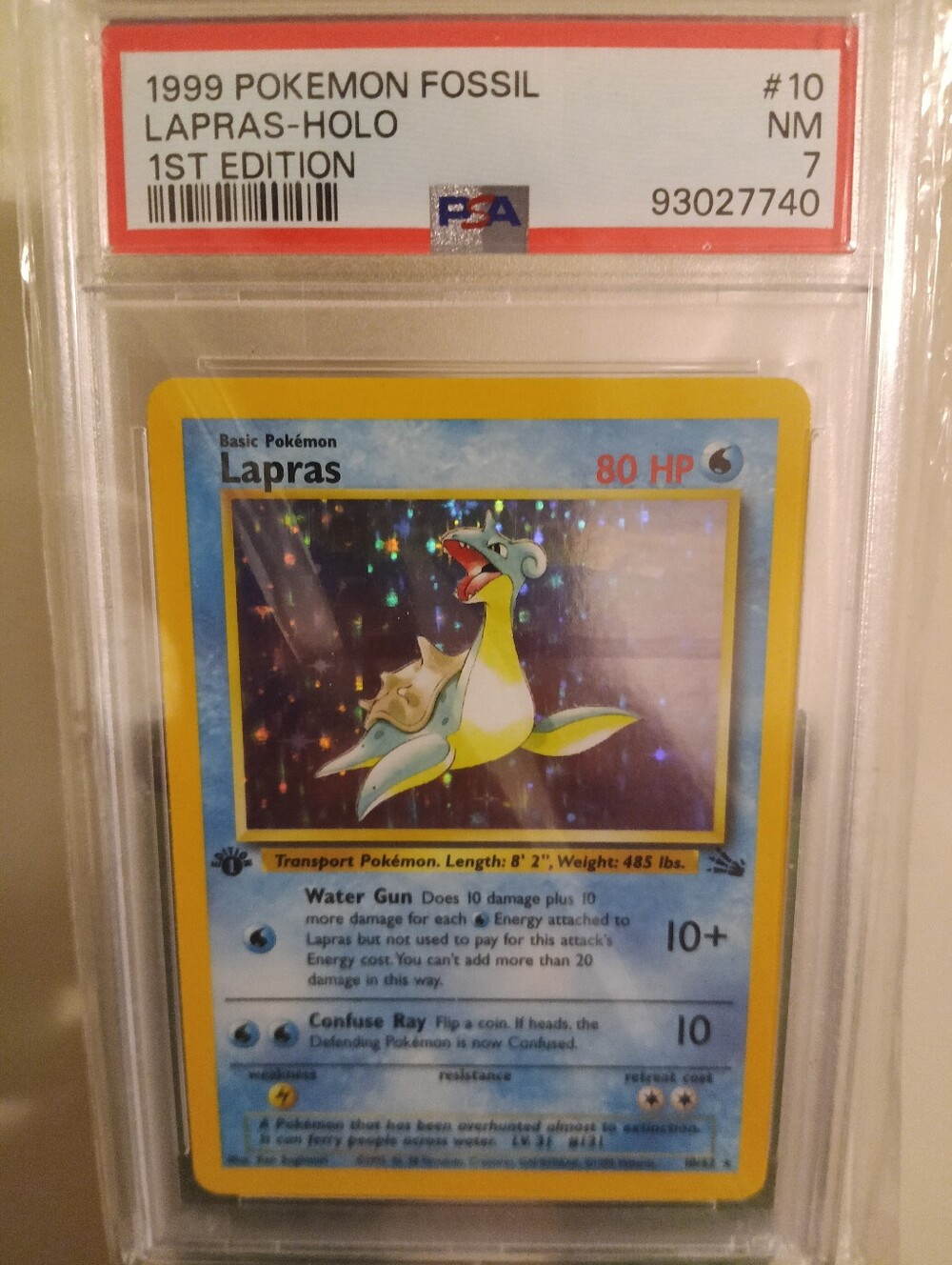 1999 POKEMON FOSSIL #10 LAPRAS-HOLO 1ST EDITION PSA 7